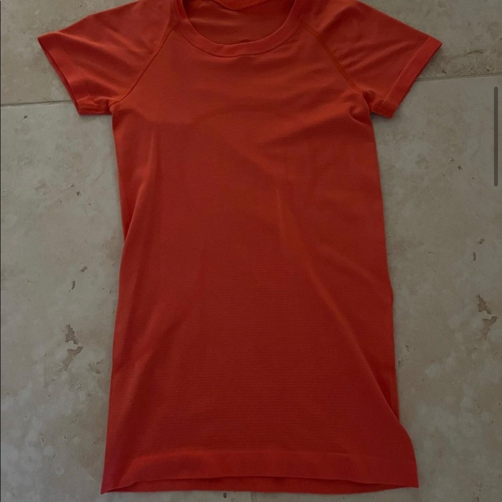 Lululemon Swiftly Tech Short Sleeve
Size: 2
Cost: $70 
Selling: $45